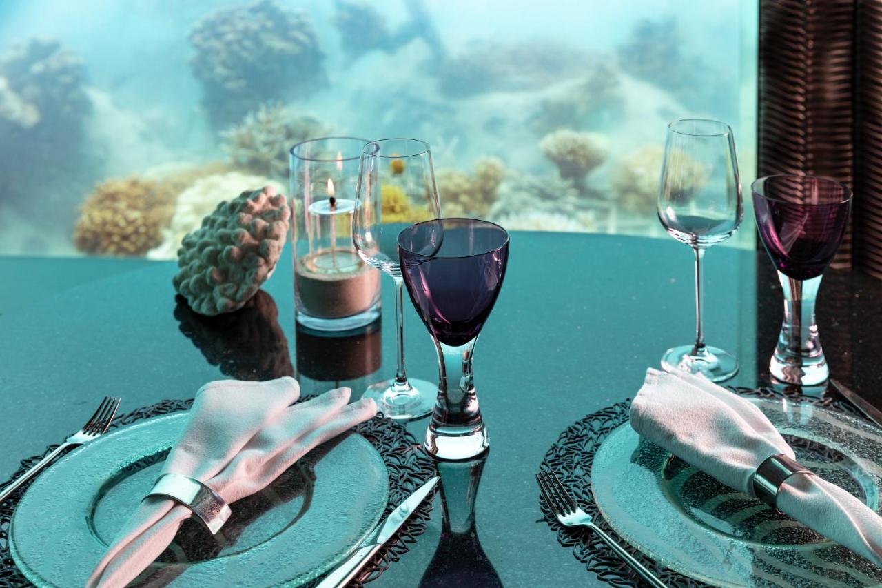 นิยามา ไพรเวต ไอส์แลนด์ มัลดีฟส์ Hotel Olhuveli  ภายนอก รูปภาพ